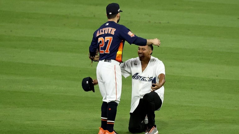 Astros Fan Arrested for Hugging José Altuve on Field During ALCS Game