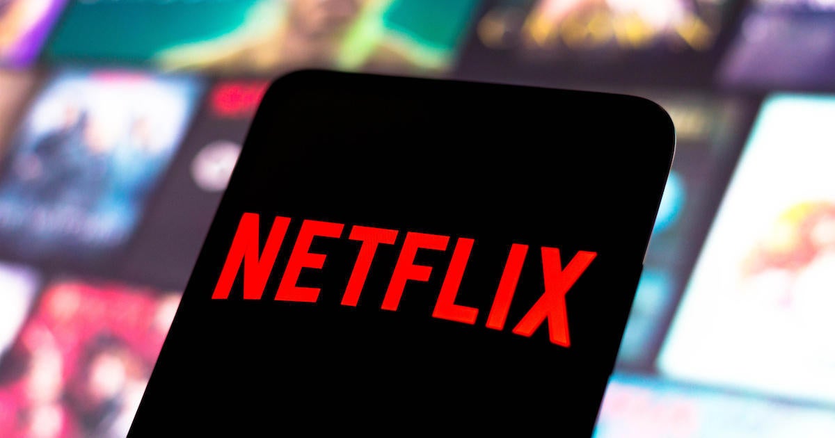 In this photo illustration, the Netflix logo seen displayed