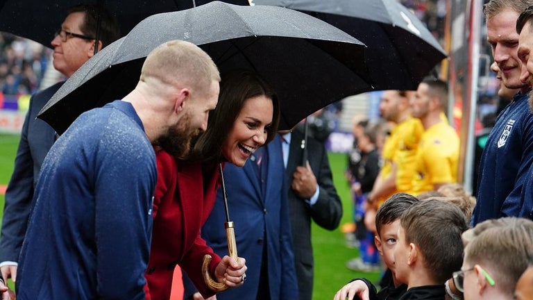 Kate Middleton Didn't Let the Rain Stop Her From Doing Her Royal Duty — Photos