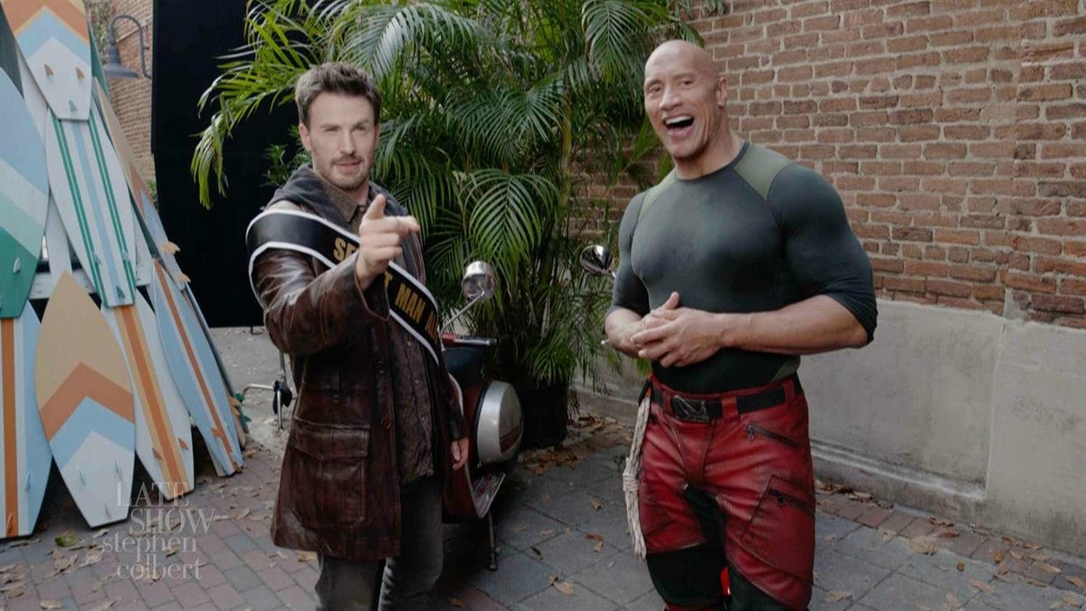 Watch Chris Evans and The Rock Agree to Share Sexiest Man Alive Title
