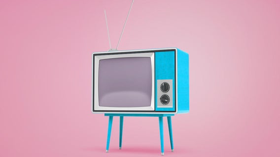 3d rendering of a blue retro TV set standing on legs and with antennas on top stand on pastel pink background.