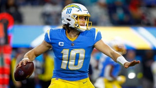 LOOK: Titans intercept Chargers' Justin Herbert on wild two-player