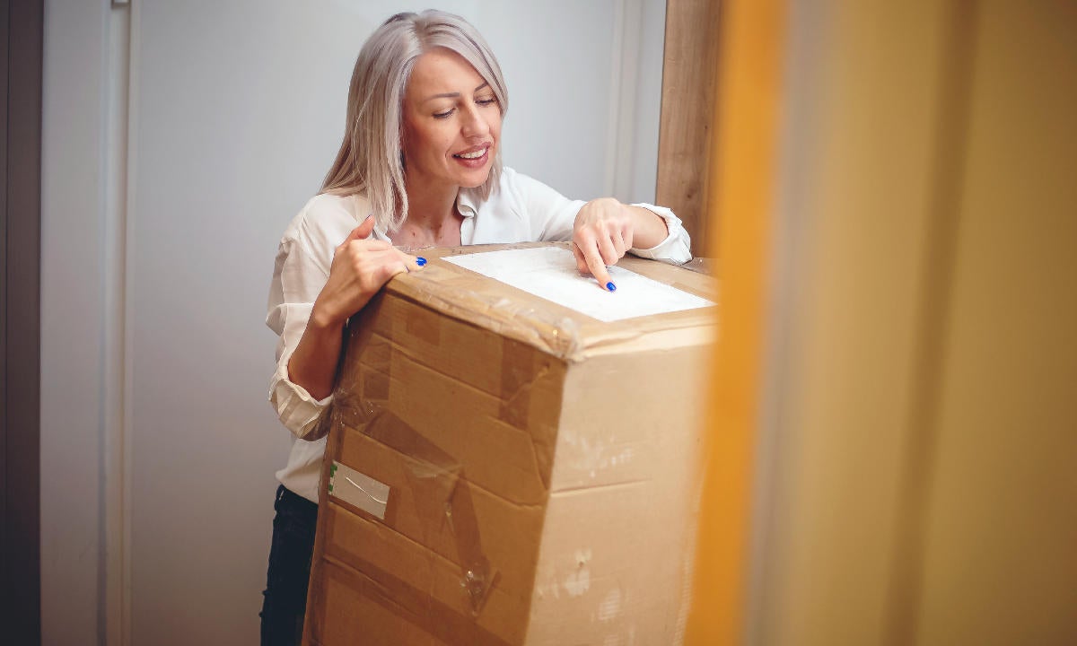 woman-buying-bulk-delivery-package-gettyimages-1187831911