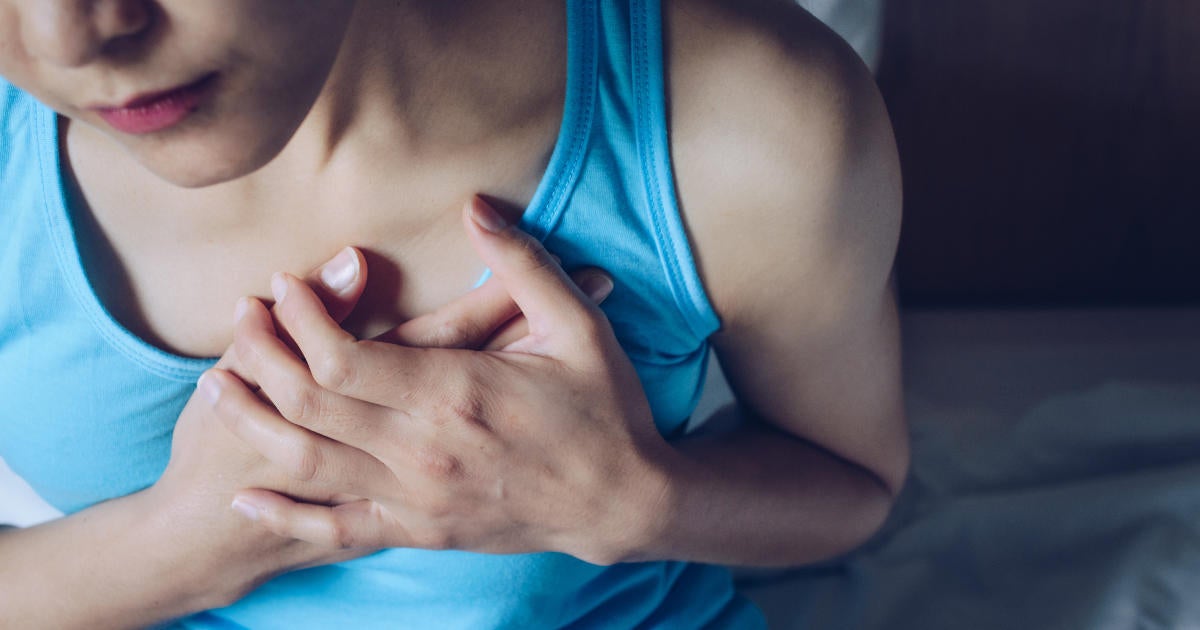 woman-having-suffering-from-chest-pain-or-heart-attack