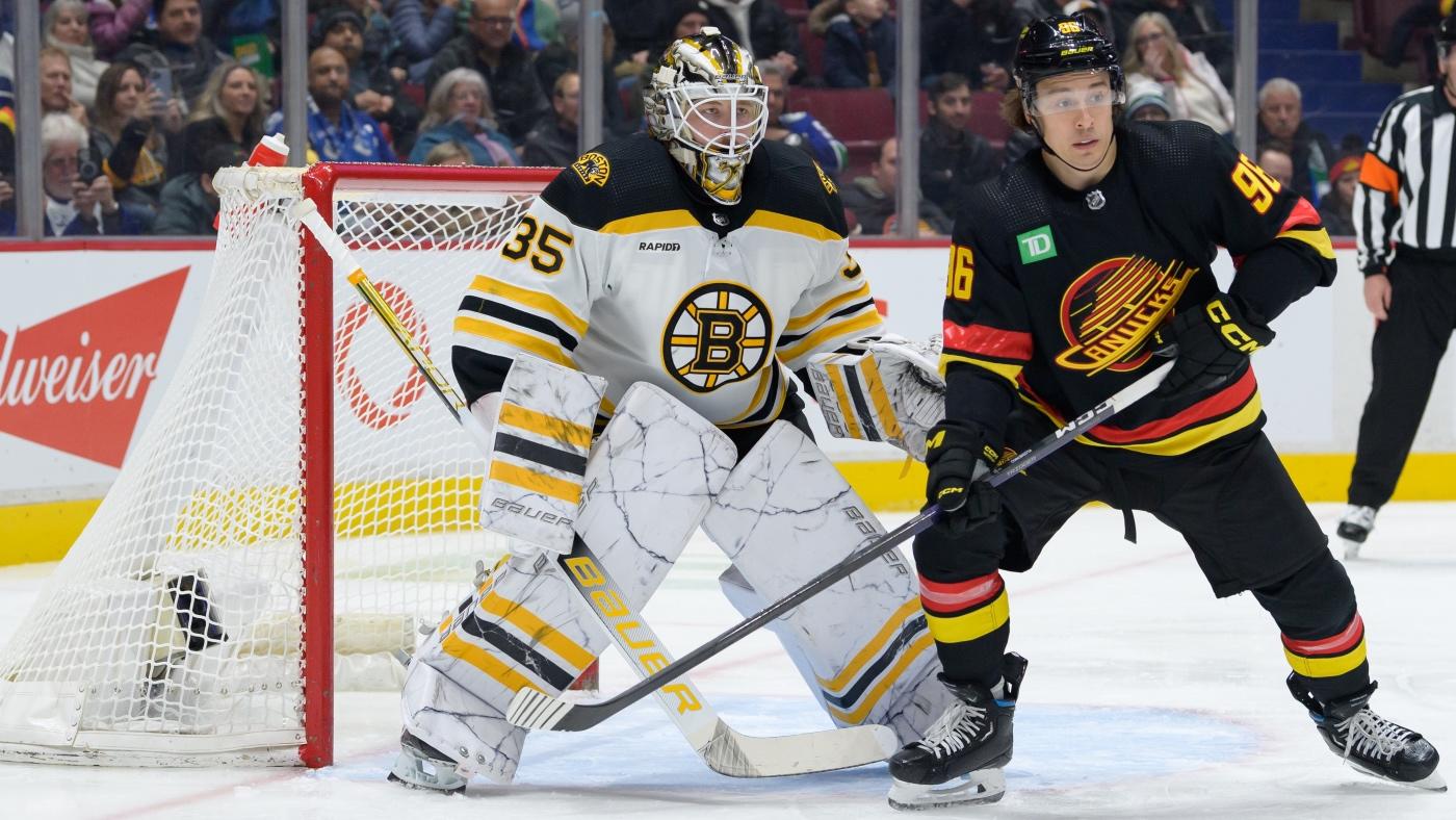 WATCH: Bruins' Linus Ullmark scores historic goalie goal to seal win against Canucks