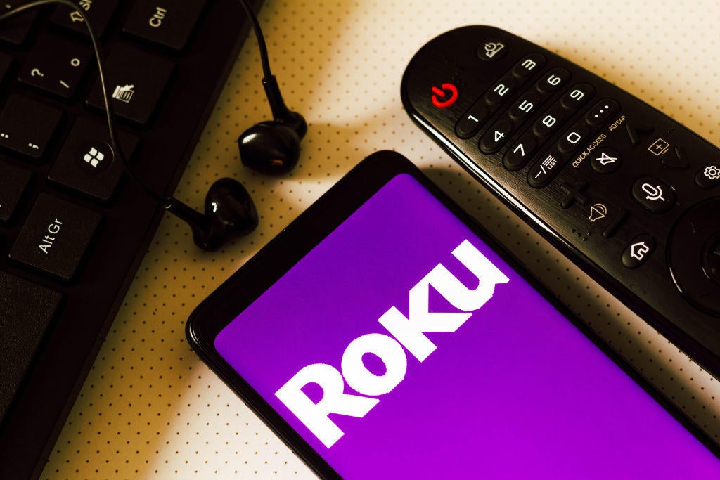 In this photo illustration, the logo of the Roku, a brand of