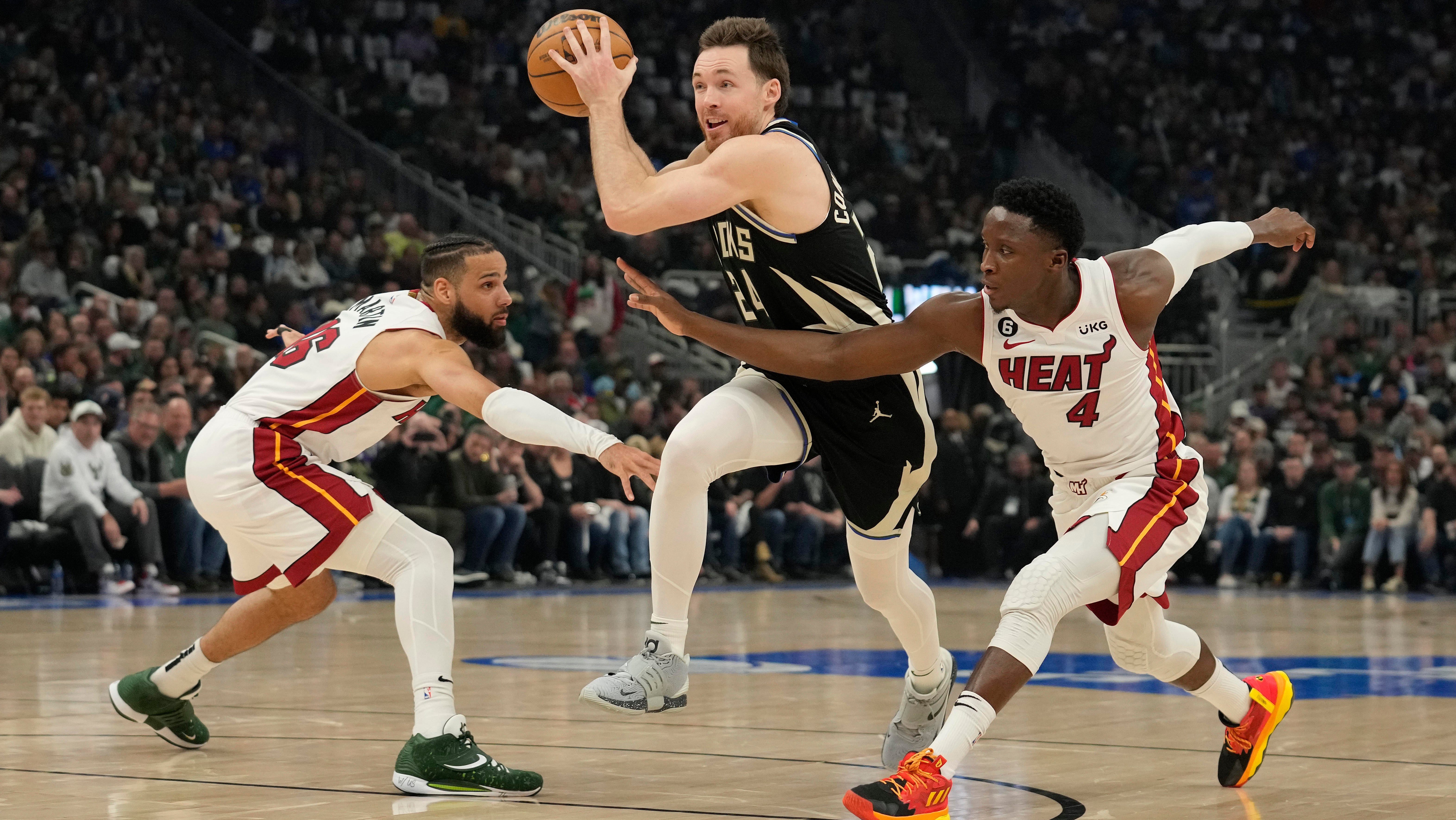 Bucks convert 25 3-pointers to match NBA playoff record in Game 2 win over Heat, without Giannis Antetokounmpo