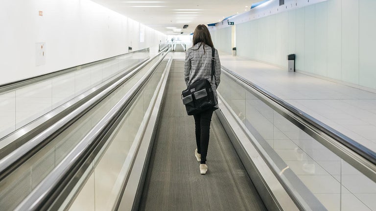 Woman Loses Leg After Getting Stuck in Moving Walkway at Airport