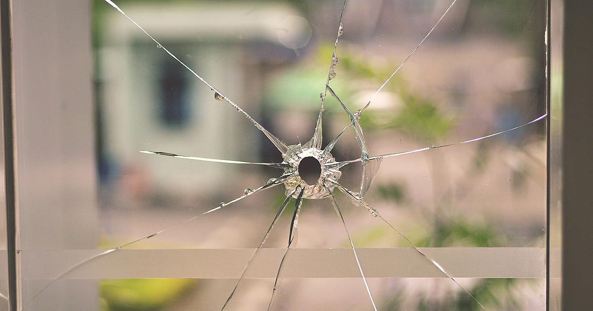 bullet-hole-on-glass-window