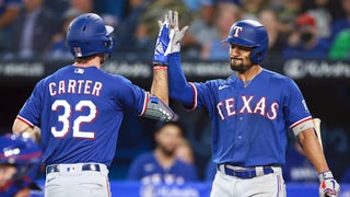 Heim, Carter help Rangers hammer Blue Jays to start crucial series