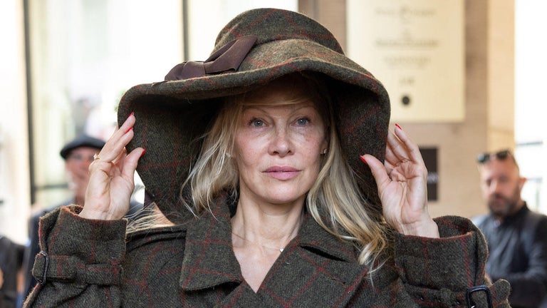 Pamela Anderson Didn't Think People Would Notice She Went Makeup-Free at Paris Fashion Week