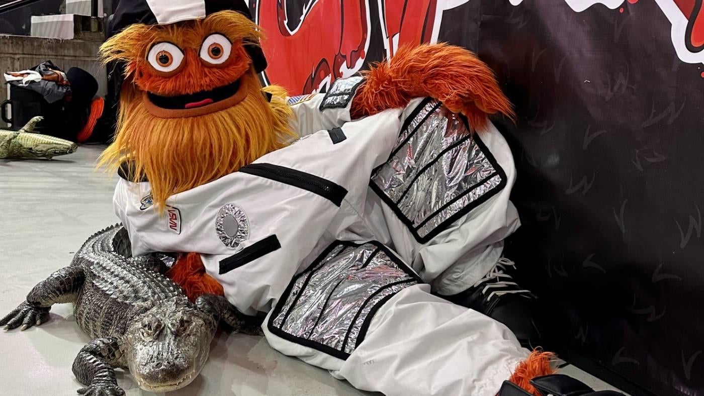 LOOK: Wally the emotional support alligator attends Flyers game, meets Gritty