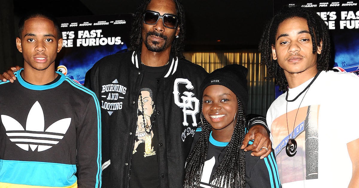 Snoop Dogg and family attend 
