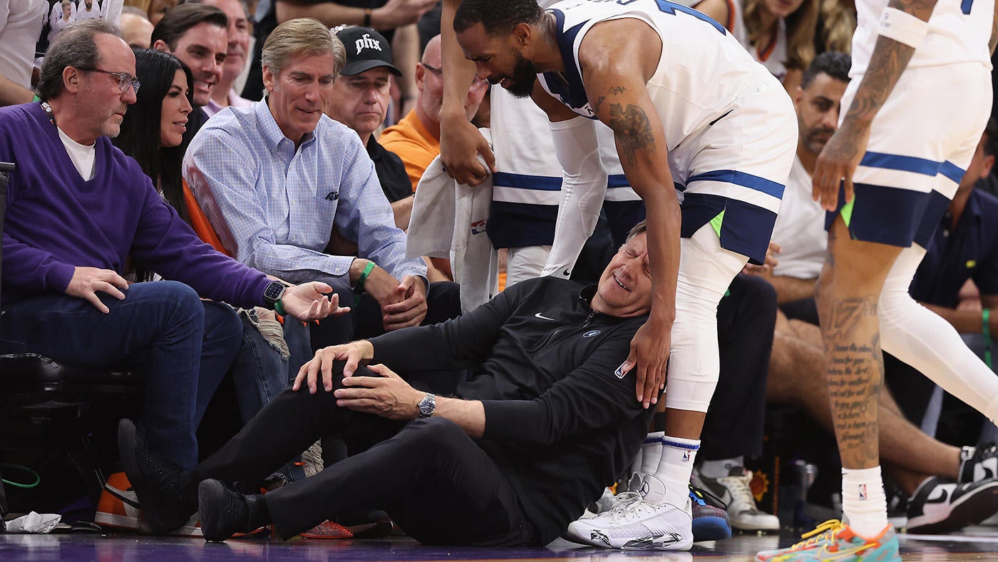 Timberwolves coach Chris Finch suffers torn patellar tendon after collision with Mike Conley