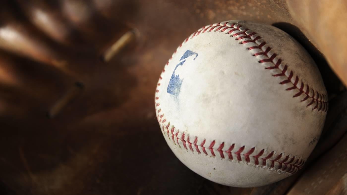 LOOK: Virginia minor league team hosts first 'cosmic baseball' game under black lights