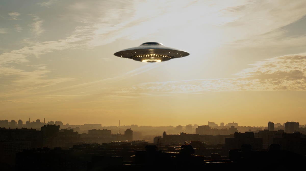 UFO saucer silently hovered over the city