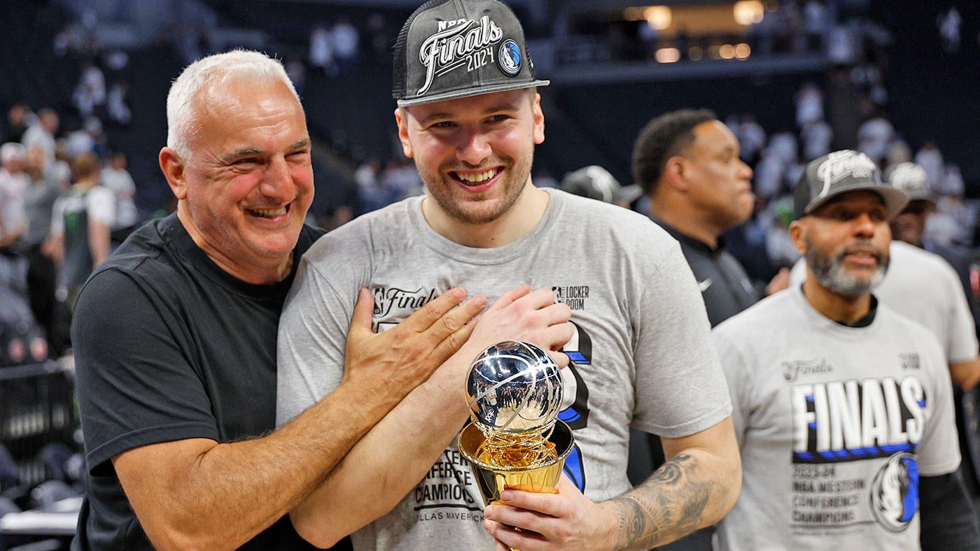 LOOK: Luka Doncic's beer gets stolen right out of his hand by Mavericks exec Michael Finley during celebration
