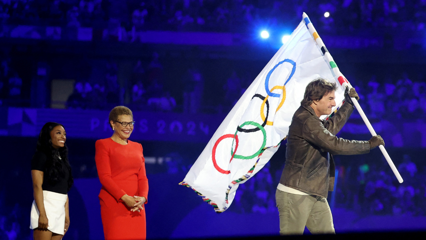 Tom Cruise jumps off Paris stadium roof as part of Olympic Games ceremonial handoff to Los Angeles for 2028