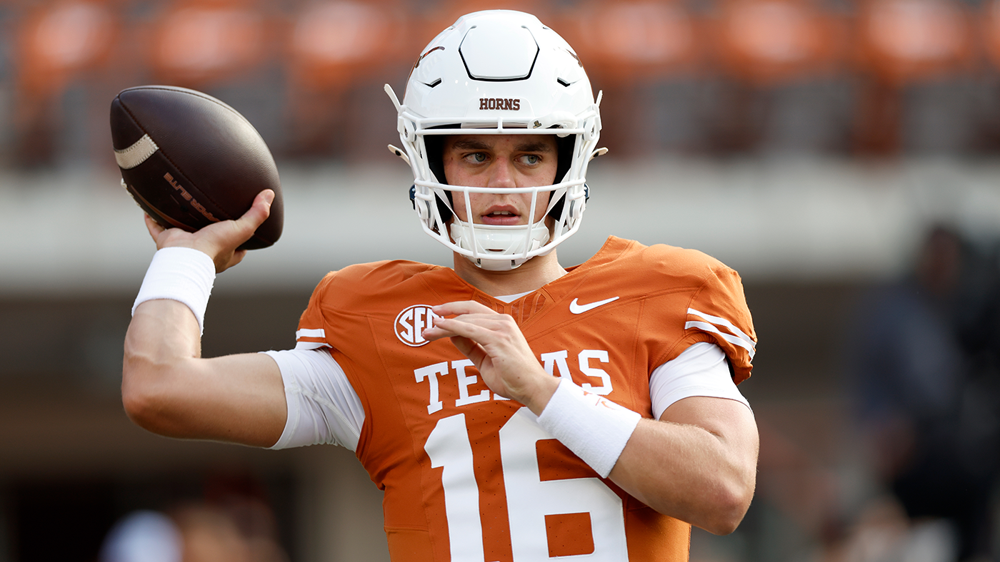 WATCH: Texas' Arch Manning throws TD on first play, scampers for 67-yard score after replacing Quinn Ewers