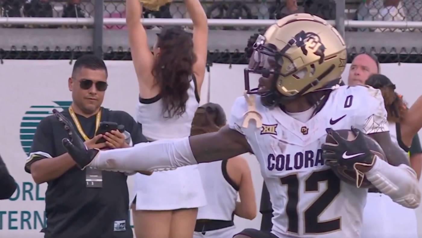 WATCH: Colorado two-way star Travis Hunter strikes Heisman Trophy pose after highlight-reel INT against UCF