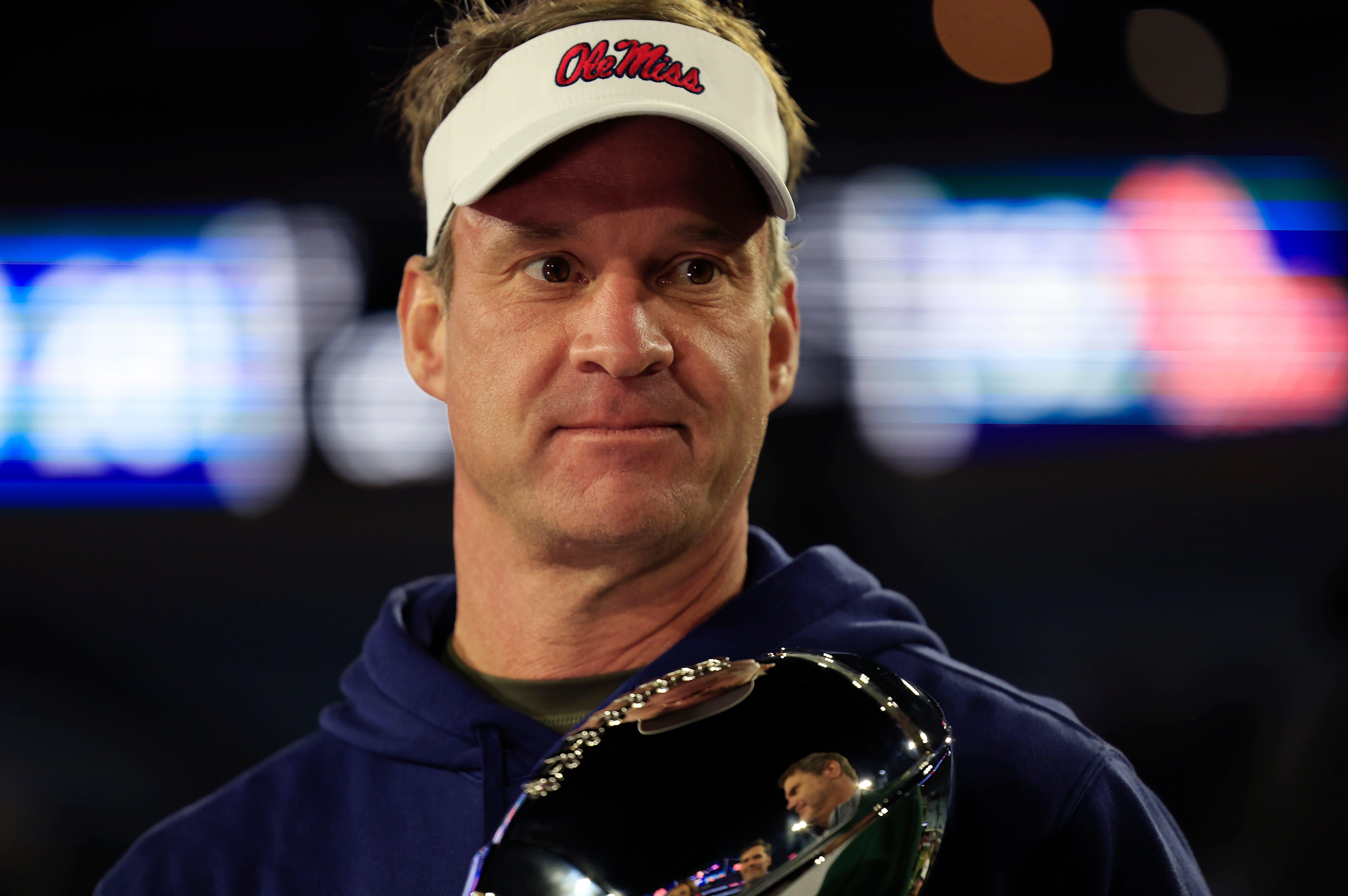 Lane Kiffin shares details on EA Sports College Football 26 cover shoot, reunion with Reggie Bush, Tim Tebow