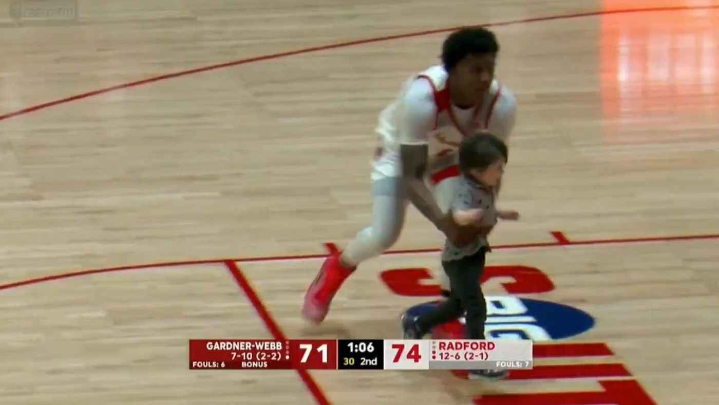 WATCH: Young fan 'storms court' late in Radford game, causes brief delay before caught by player