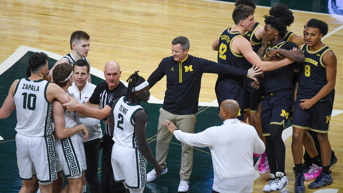 WATCH: Tempers flare when Michigan players disrupt Michigan State tradition of seniors kissing Spartans logo