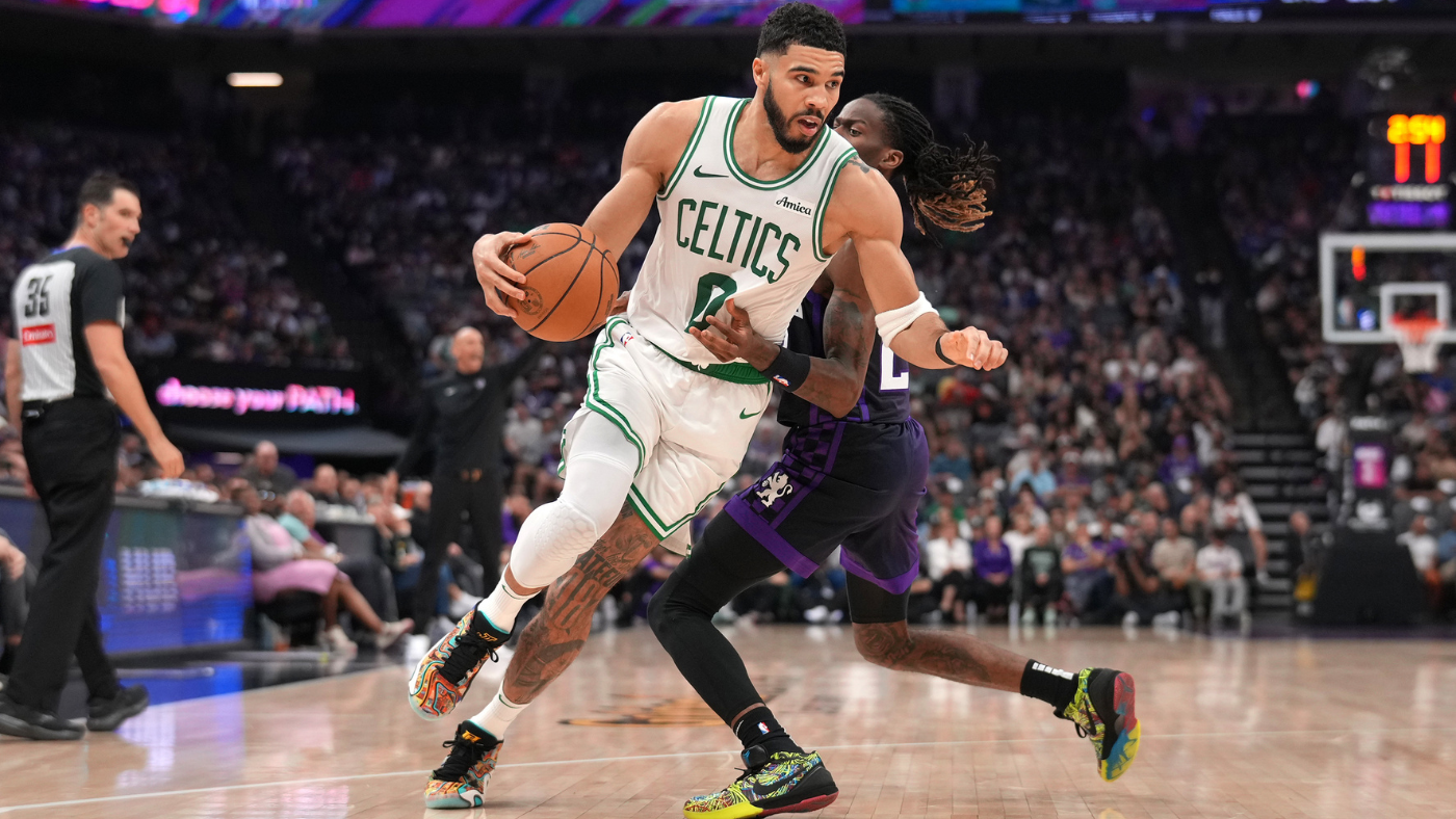 Jayson Tatum injury: Celtics star rolls ankle, leaves game vs. Kings after landing on Domantas Sabonis' foot