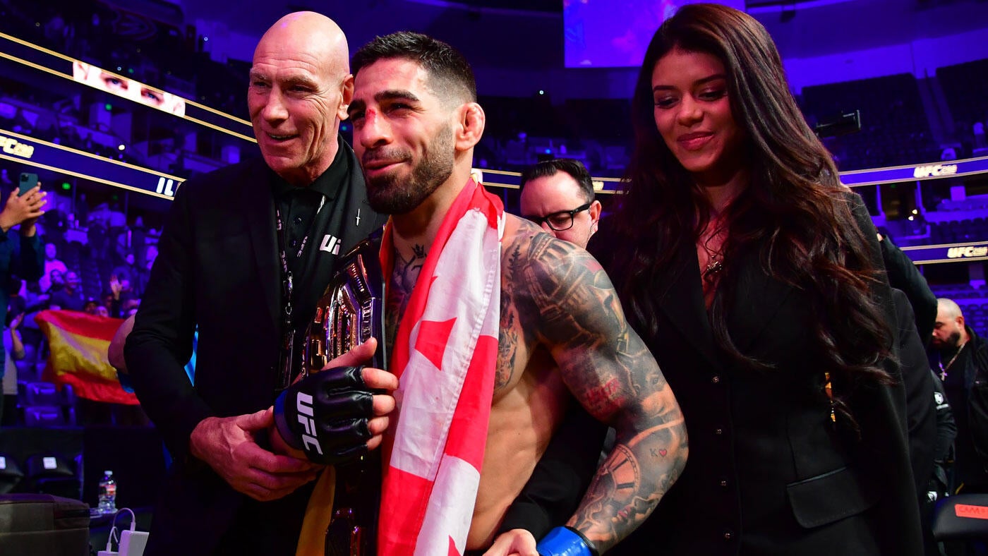 https://sportshub.cbsistatic.com/i/2025/06/26/f75886bd-d87a-49c2-b15e-095b9e36b738/ilia-topuria-smile-belt-flag-imagn.jpg