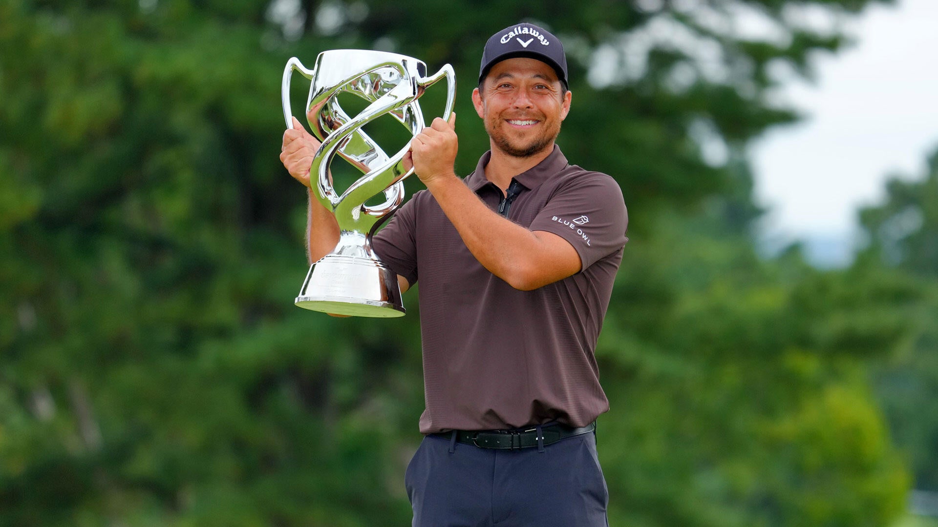https://sportshub.cbsistatic.com/i/2025/10/12/93d6dced-1e95-4ce8-b7c8-fade422bf967/xander-schauffele-baycurrent-trophy.jpg