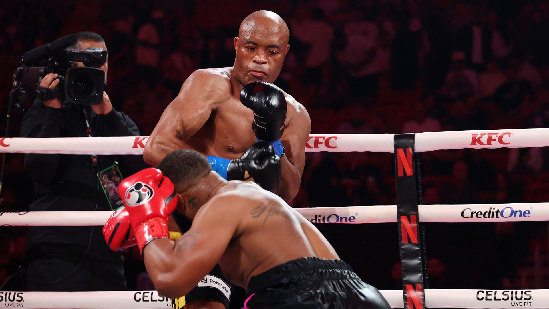 Anderson Silva, 50, knocks out fellow MMA legend Tyron Woodley on Jake Paul vs. Anthony Joshua undercard