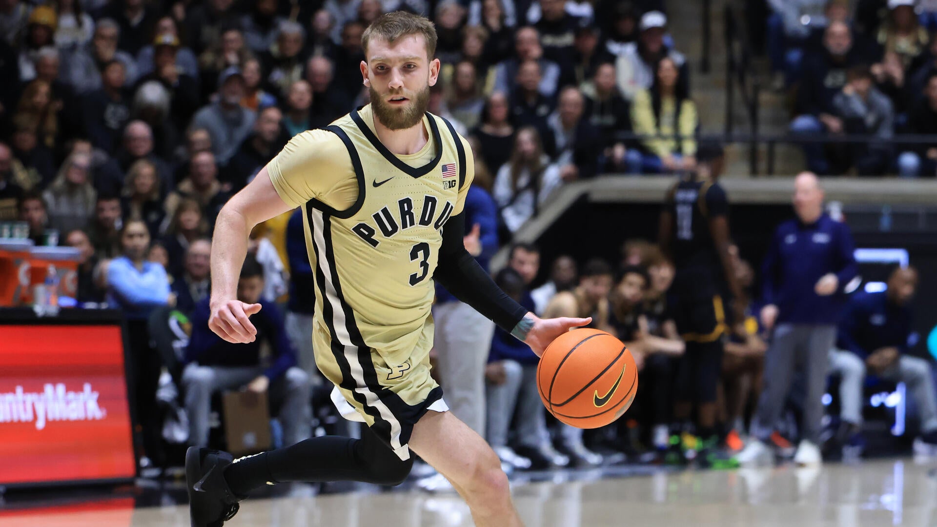 College basketball picks, schedule: Predictions for Purdue vs. Wisconsin and more Top 25 games