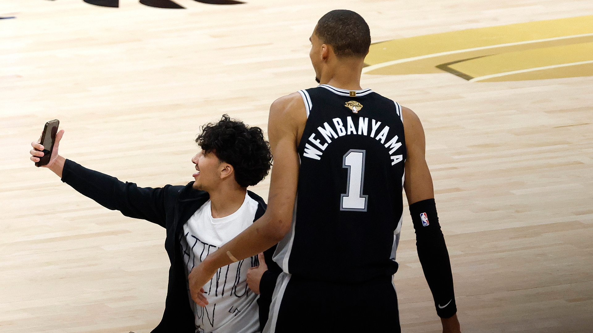 Fan Banned for Life from NBA Arenas After On-Court Selfie Attempt with Wembanyama