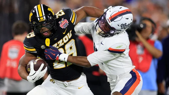 2025-12-28t023540z-657621607-mt1usatoday27891308-rtrmadp-3-missouri-tigers-running-back-ahmad-hardy-29-fends-off-1.jpg