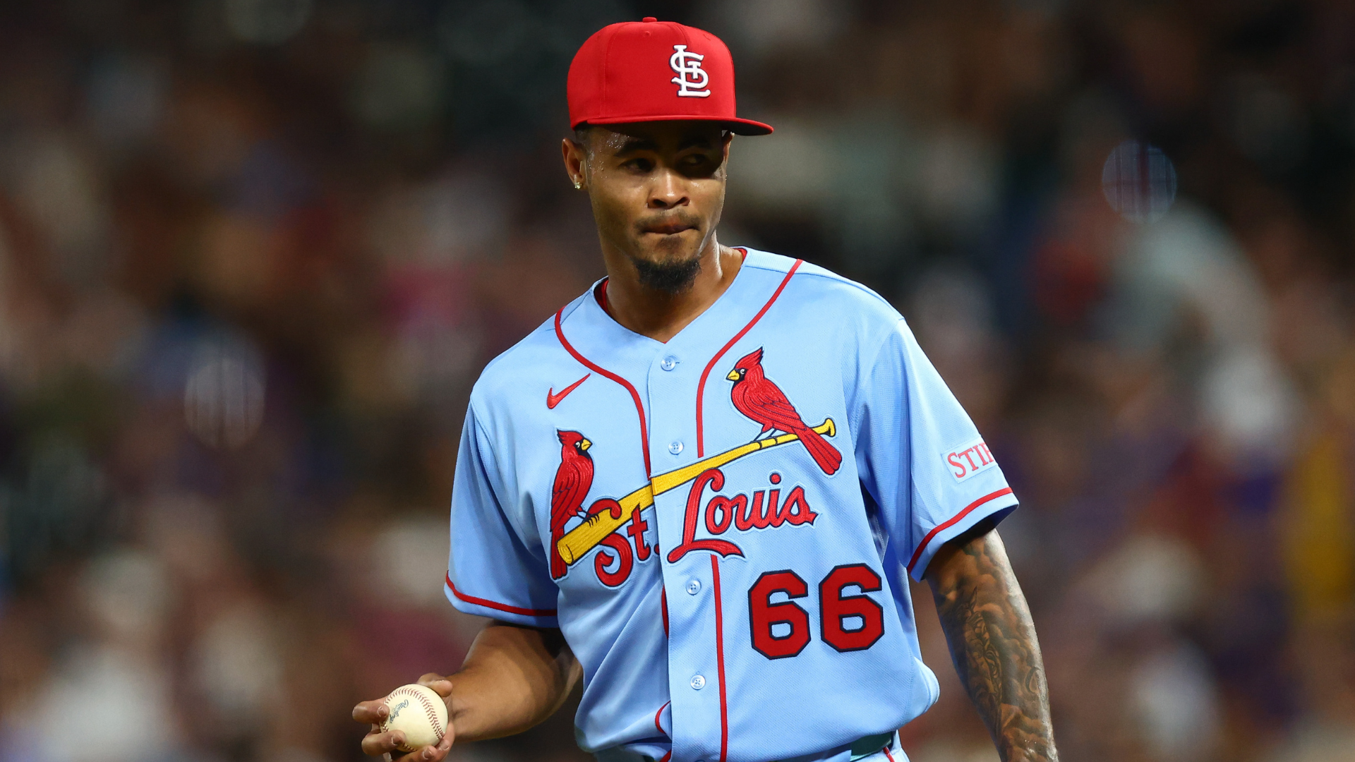Cardinals, Rockies players tilt hats in protest after umpire's 'power-hungry move' against rookie pitcher