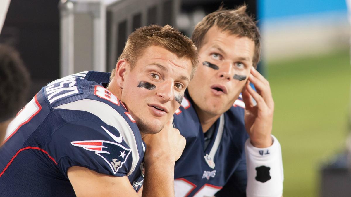 Tom Brady takes batting practice with Rob Gronkowski