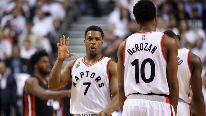 Kyle Lowry talks to DeMar DeRozan