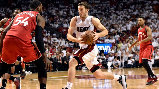 Goran Dragic drives against Raptors