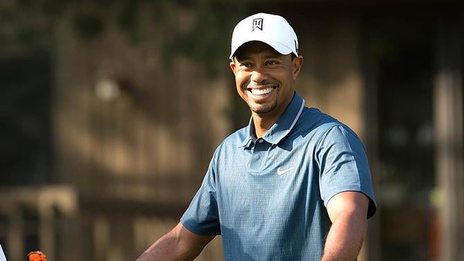 tigerwoodssmiling51716.jpg