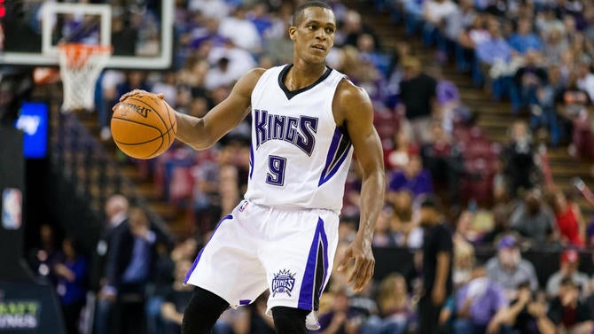 Rajon Rondo handles the ball