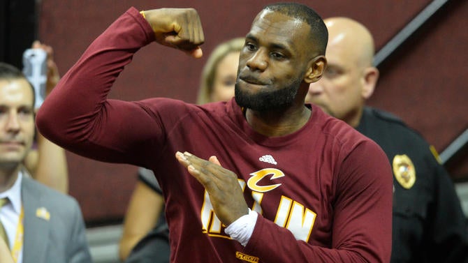 LeBron James flexes after the win