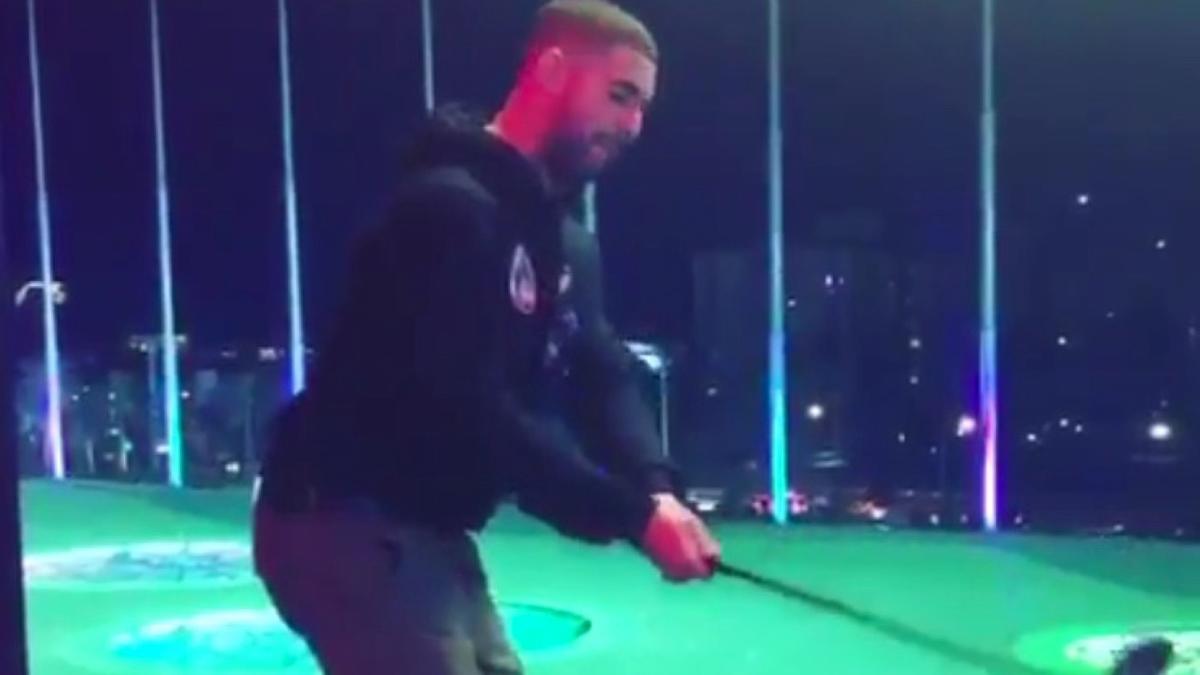 WATCH Drake methodically works on his golf game at party spot