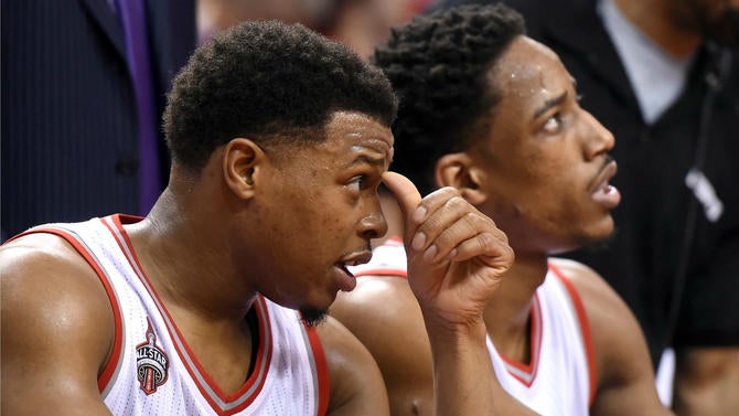 DeMar DeRozan and Kyle Lowry on the bench