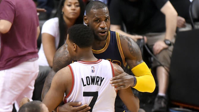 LeBron James hugs Kyle Lowry