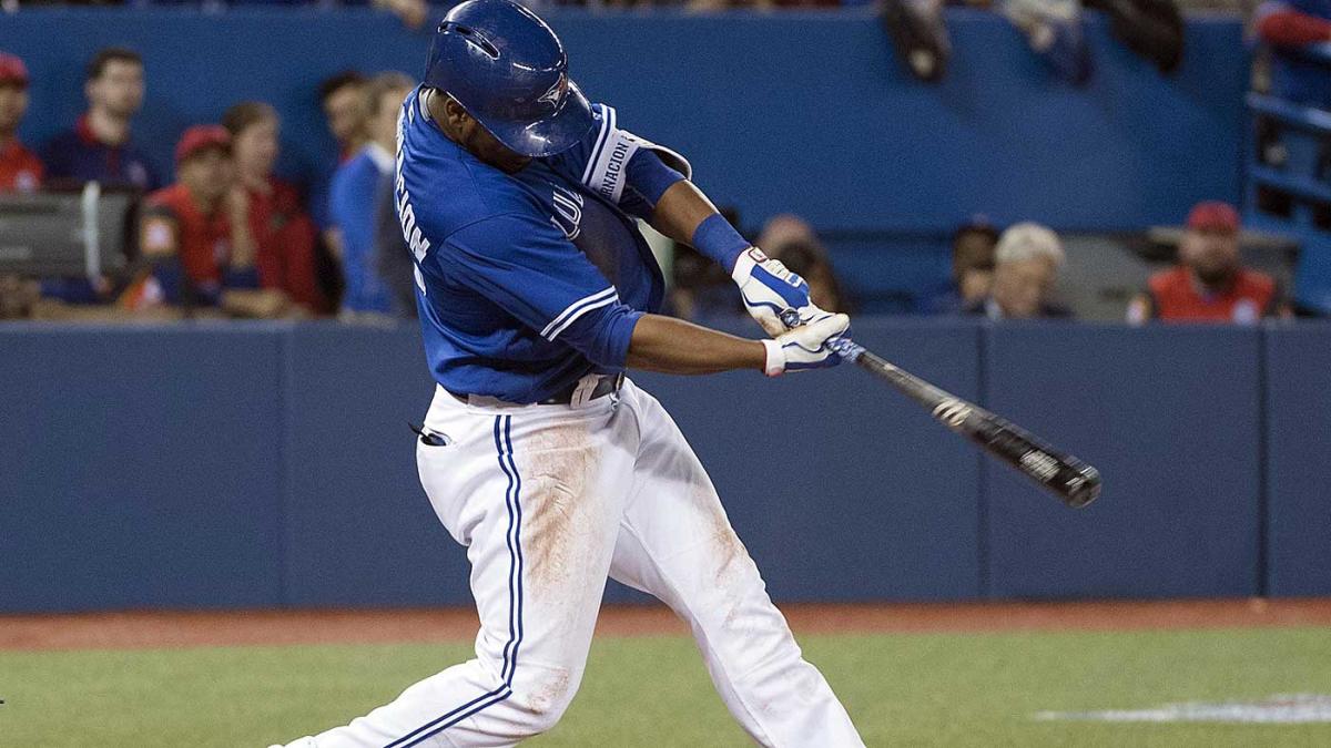 Toronto Blue Jays' Edwin Encarnacion reacts after hitting walk off