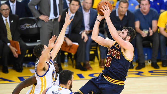 Kevin Love shoots in the Finals