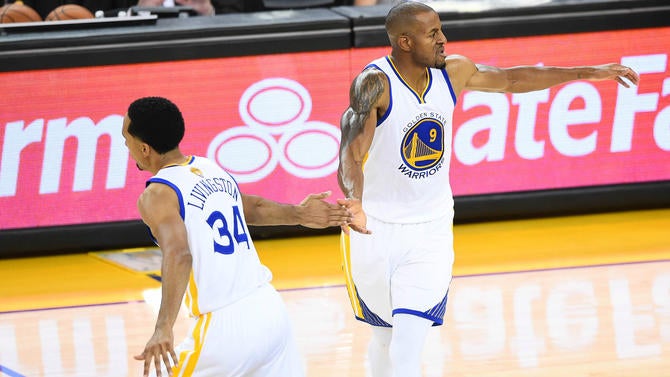 Shaun Livingston and Andre Iguodala celebrate during the NBA Finals
