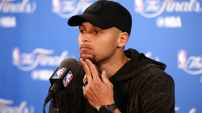 Stephen Curry talks to media after Game 2 of the NBA Finals