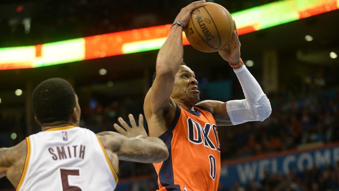 Russell Westbrook dunks against the Cavs
