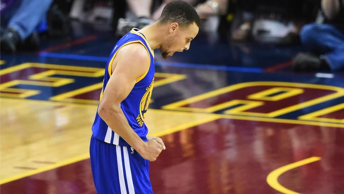 Stephen Curry celebrates in Game 4 in Cleveland